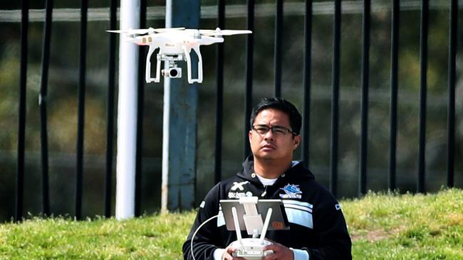 Mark Leabres pilots the drone at Sharks training.