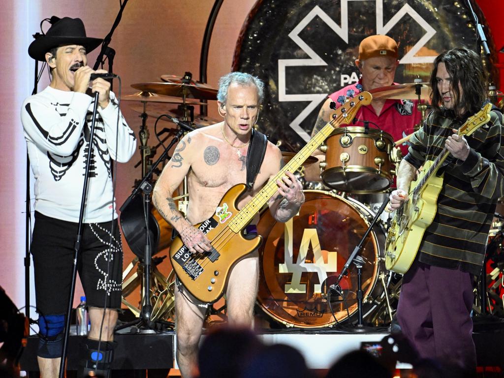 Anthony Kiedis, Flea, Chad Smith, and John Frusciante of Red Hot Chili Peppers perform onstage during the FIREAID Benefit Concert for California Fire Relief at The Kia Forum on January 30, 2025 in Inglewood, California. (Photo by Scott Dudelson/Getty Images for FIREAID)