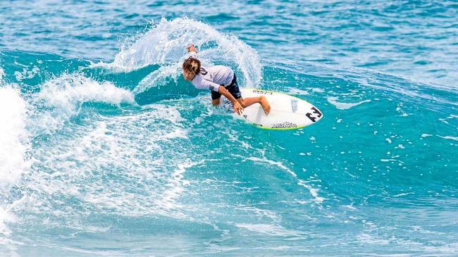 FAMILY TIES: Ty Richardson surfed with his uncle Joel Parkinson to win the Family Teams event at the Eager Beaver surf charity event last year at Palm Beach and will be back for this year's event on January 27. Picture: BEN STAGG/SURFING QLD