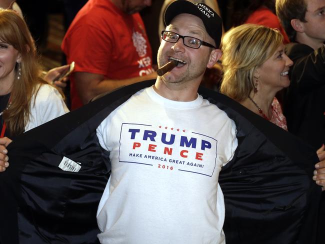 Jake Viano shows his support for President-elect Donald Trump at the Colorado Republican election night party Wednesday, Nov. 9, 2016, in Greenwood Village, Colo. (AP Photo/Jack Dempsey)