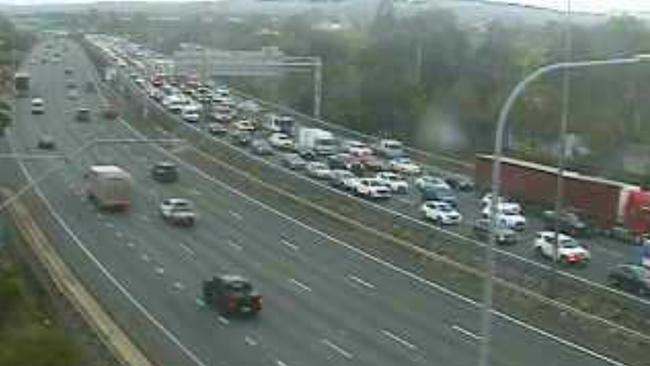 Traffic on the Pacific Motorway, southbound at the Logan River Bridge just before 8am. Picture: Straya.io