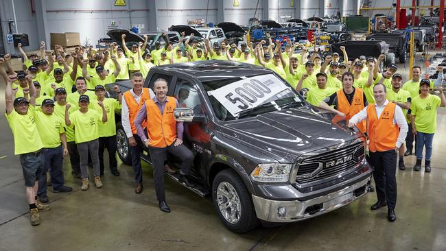 Ram Trucks Australia employees with the 5000th ute remanufactured in Melbourne. Picture: Cameron Murray