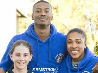 GOOD HABITS: Mountaineers players Harold Ridgeway and Donnaizha Fountain talk with Middle Ridge State School students Laura Fry and Harry Junior Patterson about the club's Positive Choices program. Picture: Nev Madsen