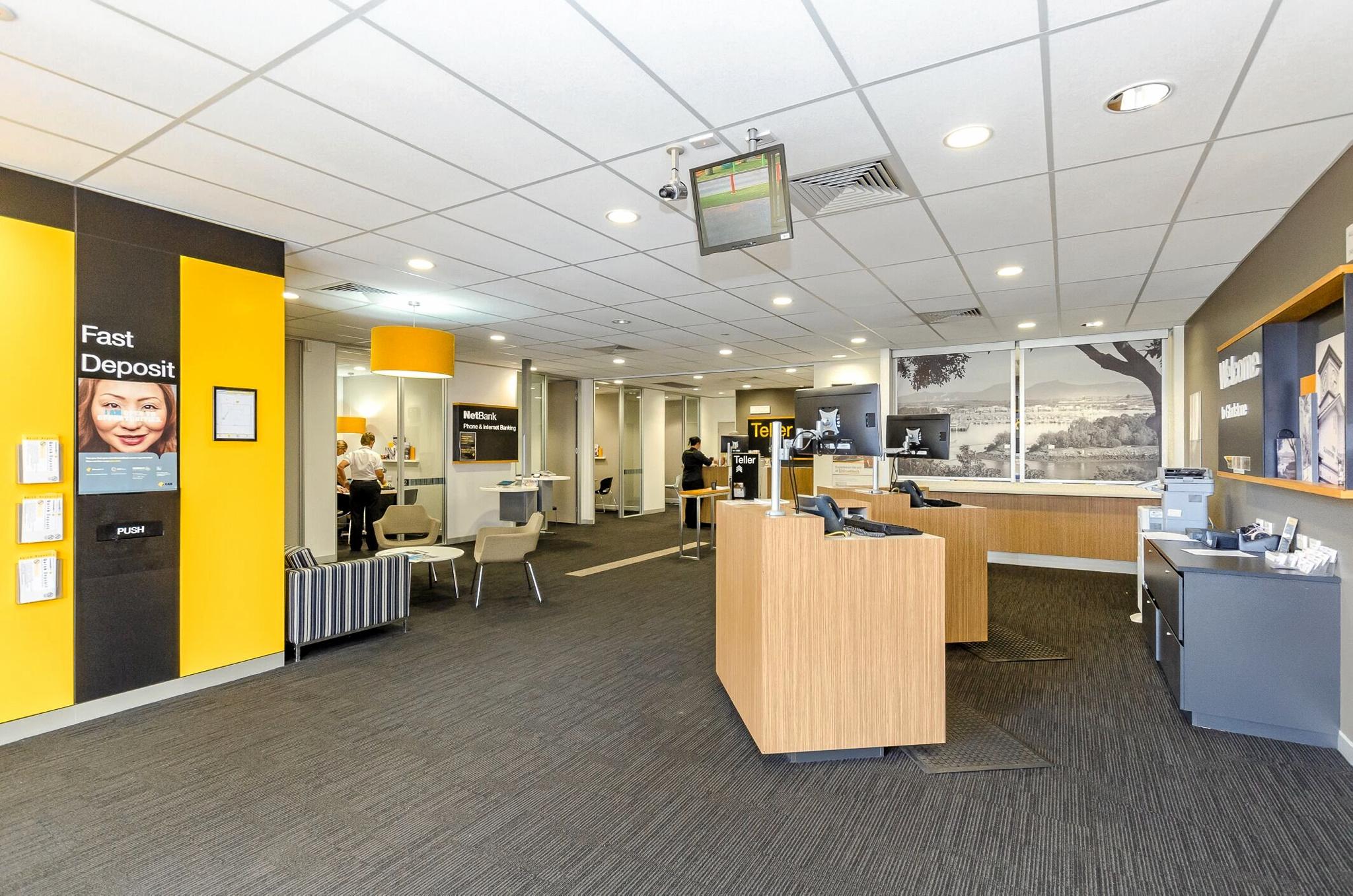 LJ Hooker has listed 81 Goondoon St, where Commonwealth Bank, Uber Hair and Hello World are, for sale.