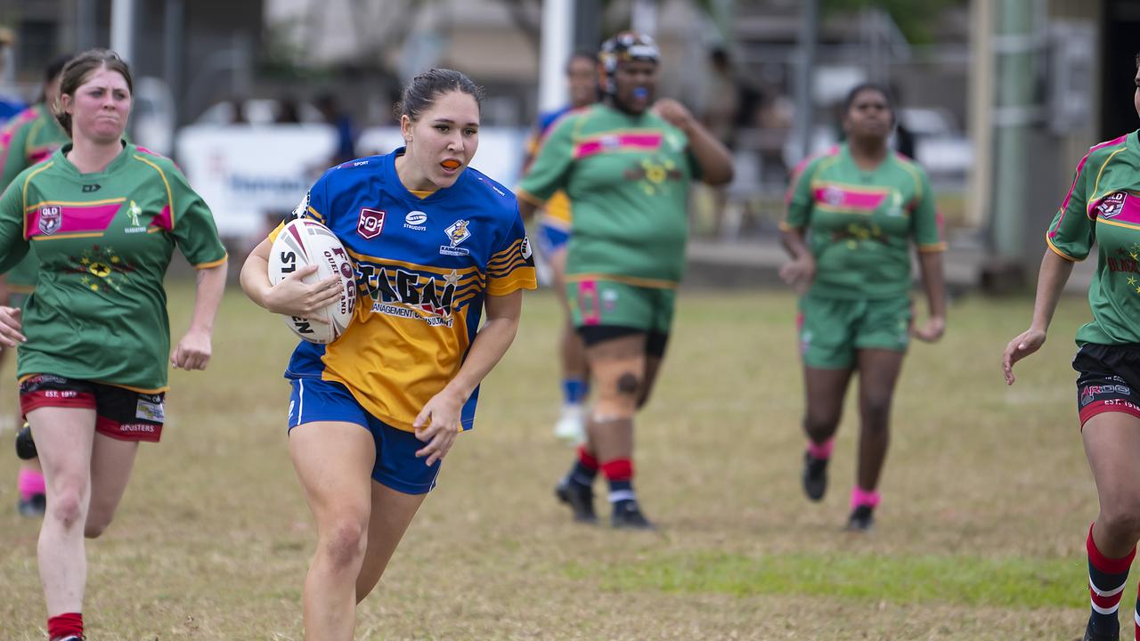 Indianna Tillett of the Kangaroos crosses the try line during CDRL Womens Kangaroos v Mareeba at Vico Oval on Sunday. Picture Emily Barker.