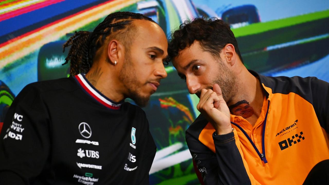 MONZA, ITALY - SEPTEMBER 08: Lewis Hamilton of Great Britain and Mercedes and Daniel Ricciardo of Australia and McLaren attend the drivers press conference during previews ahead of the F1 Grand Prix of Italy at Autodromo Nazionale Monza on September 08, 2022 in Monza, Italy. (Photo by Dan Mullan/Getty Images)