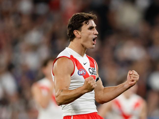 MELBOURNE, AUSTRALIA - MARCH 15: Sam Wicks of the Swans celebrates a goal during the 2024 AFL Round 01 match between the Collingwood Magpies and the Sydney Swans at the Melbourne Cricket Ground on March 15, 2024 in Melbourne, Australia. (Photo by Dylan Burns/AFL Photos via Getty Images)