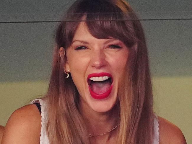 KANSAS CITY, MISSOURI - SEPTEMBER 24: Taylor Swift reacts during the first half of a game between the Chicago Bears and the Kansas City Chiefs at GEHA Field at Arrowhead Stadium on September 24, 2023 in Kansas City, Missouri. (Photo by Jason Hanna/Getty Images)