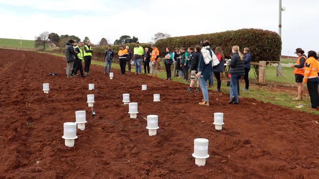 TIA researchers showing off QUOLL devices to agricultural industry figures at its Forthside Vegetable Research Facility. Picture: Supplied.