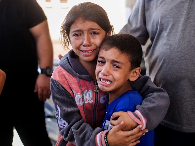 Children crying because of Israeli raids in Khan Yunis, Gaza. Picture: Getty Images