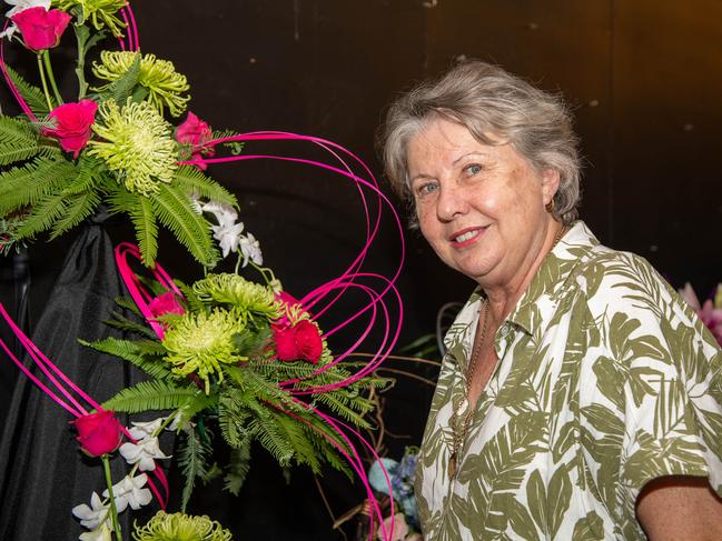 Carol Jackson, president TFAG, admires the intermediate section Grand Champion arrangements by Paul Morgan.Heritage Bank Toowoomba Royal Show.Friday April 19th, 2024 Picture: Bev Lacey