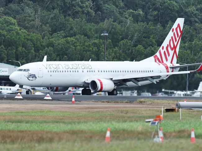 Construction on the Cairns Airport's eastern aviation precinct has begun, with initial earthmoving work underway at the site of the old runway, south of the domestic terminal. Early works will see the site raised above the Q100 flood height. Picture: Brendan Radke