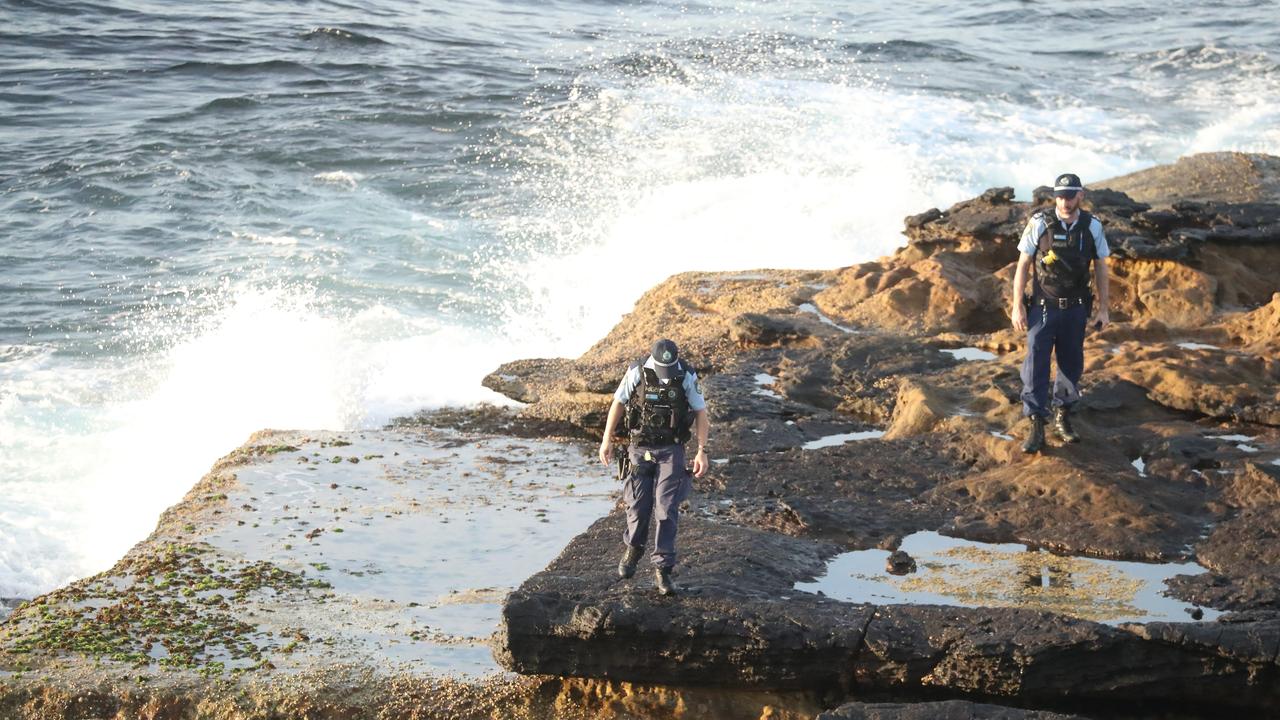 Police at Little Bay this morning. Picture: John Grainger