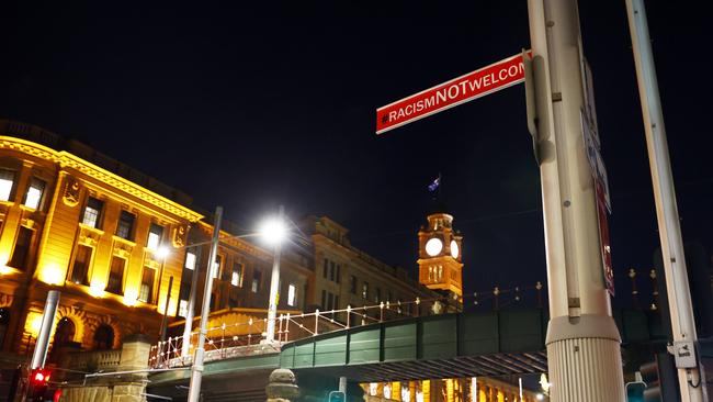 One of the controversial signs at Central Station in Sydney. Picture: Richard Dobson