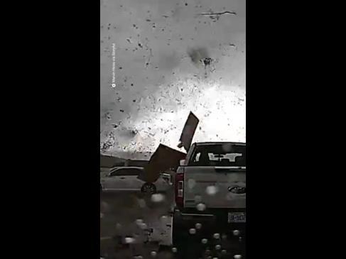 Moment huge tornado rips through town