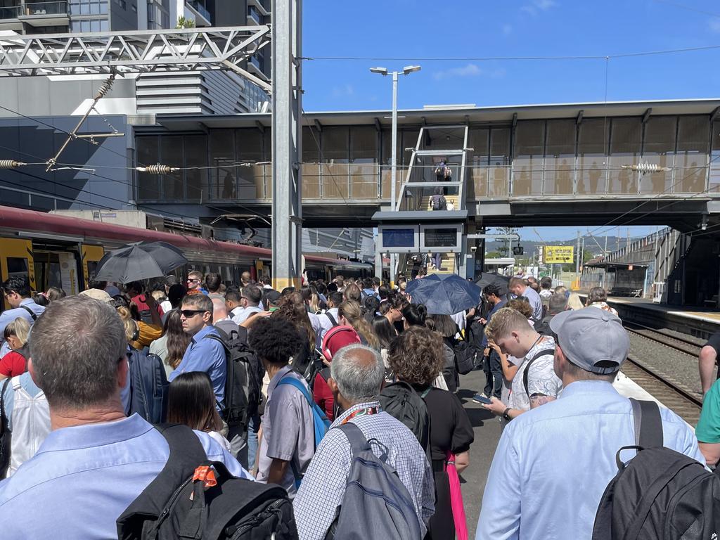 Commuters fill the platform at Milton during the disruption Monday morning. Picture: Nicola McNamara