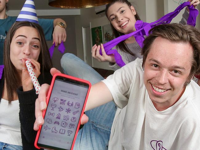 Monash University student Tom Andrews aged 19 is taking on Facebook with a party app he believes could shake up the way the world uses social media and plans social gatherings.Tom  was inspired to create PlusOne by his friends' growing frustration at the spam and clickbait flooding their Facebook feeds. Tom holds the phone as his friends Filip Terek , Maddie Andreopoulos , Lauren Gabriele and Kurtis Leitner enjoy the party. Picture : Ian Currie