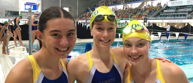 Loreto College swimmer  Elke Becks, middle, winner of the 16 years 50m breaststroke, flanked by team mates Abbey O'Toole and Emma Burne at the CaSSSA Cup swimming carnival held at Chandler. 