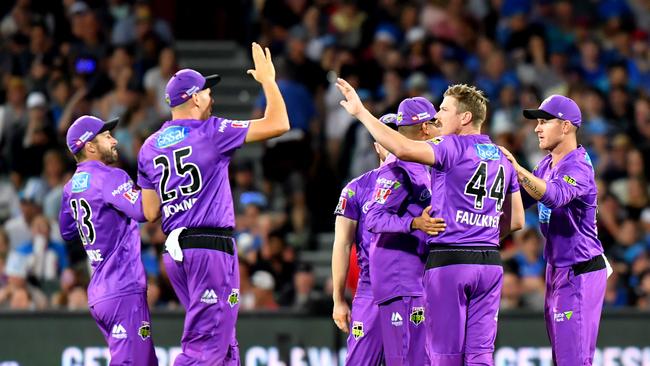 Hurricanes players celebrate the wicket of Alex Carey during the Big Bash League match against the Adelaide Strikers on Sunday. Picture: AAP/SAM WUNDKE