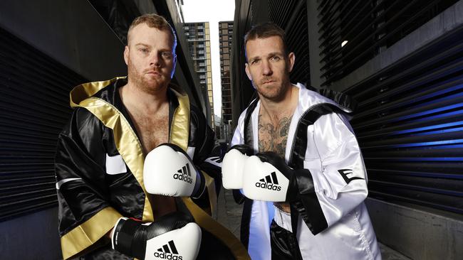 Adam Cooney and Dane Swan will square off in the ring. Picture: Alex Coppel