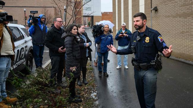 A police officer updates the media outside the Altoona Police Department in Pennsylvania. Picture: Getty Images