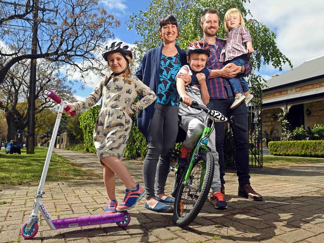 Kate Bolton, Simon Hardman and their children Jude, 8, Anna, 6 and Zoe, 2, outside their Glenunga home. Picture: Tom Huntley