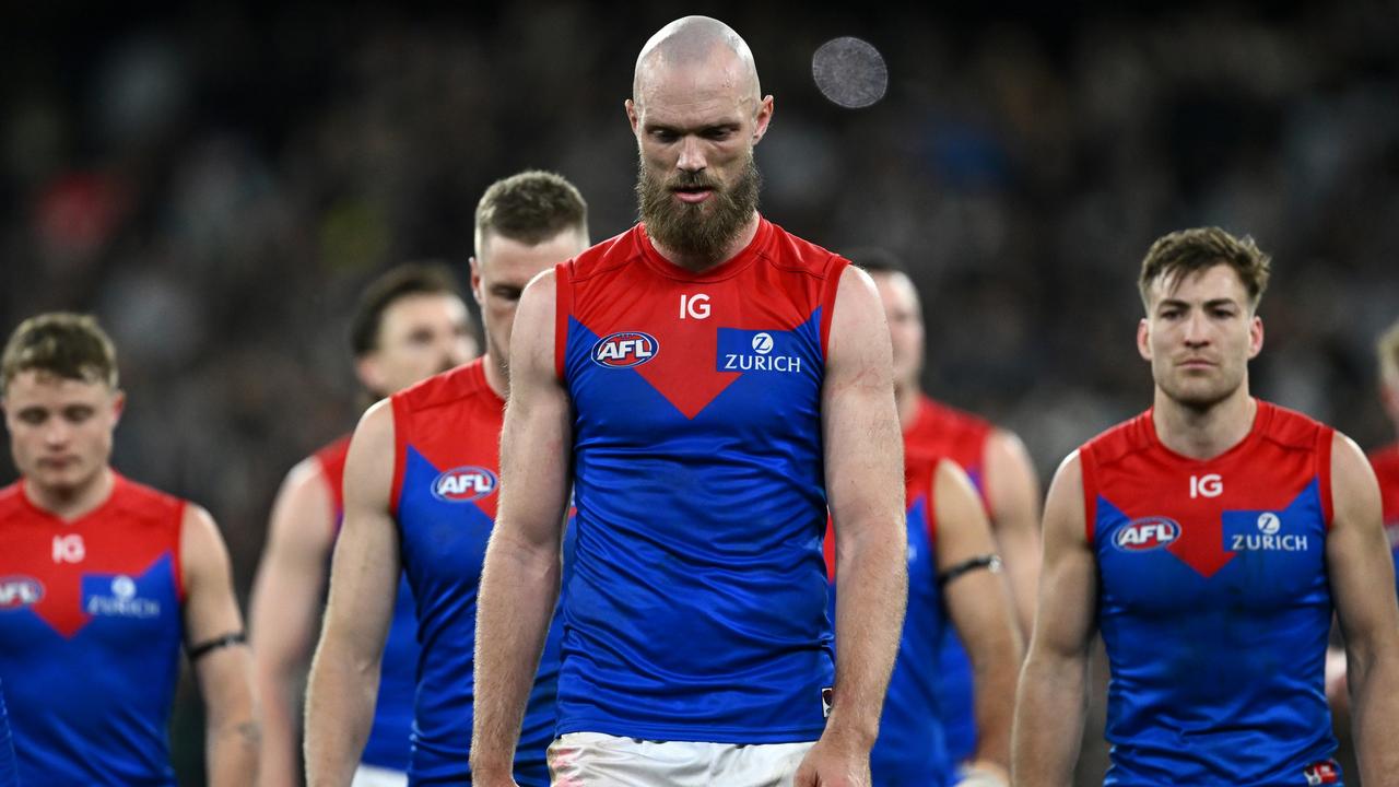 MELBOURNE, AUSTRALIA - SEPTEMBER 07: Max Gawn and his Demons team mates look dejected after losing the AFL First Qualifying Final match between Collingwood Magpies and Melbourne Demons at Melbourne Cricket Ground, on September 07, 2023, in Melbourne, Australia. (Photo by Quinn Rooney/Getty Images)