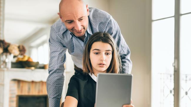 Parents should help their children learn how to react to and report inappropriate social media content. Picture: iStock