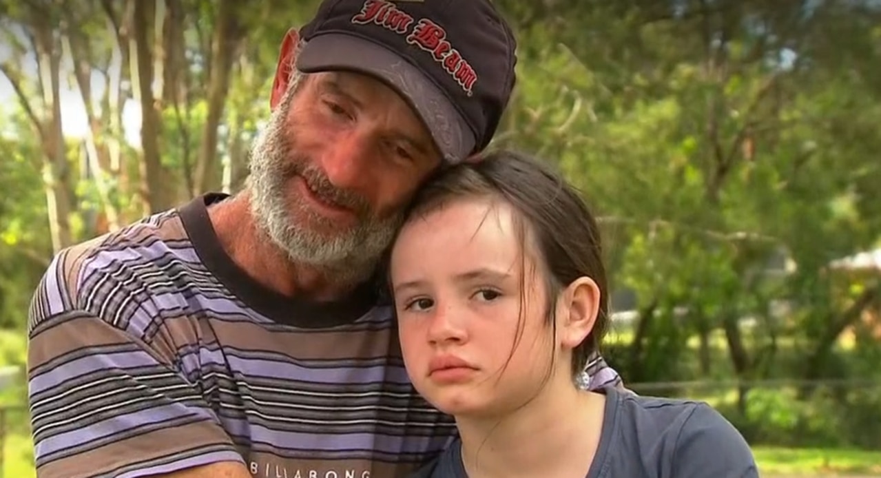 Craig and his young daughter Kira managed to survive two harrowing nights clinging to a tree, surrounded by deep flood water at Gympie. Picture supplied.