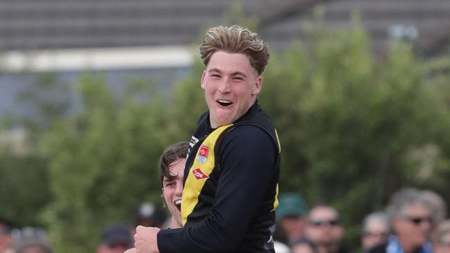 Torquay’s Sheldon Ham and Baxter Mensch celebrate a goal against Anglesea in the 2024 BFNL grand final. Picture: Mark Wilson