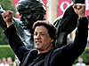 Sylvester Stallone and Rocky statue /AP