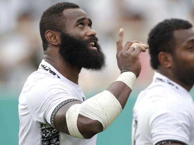 Fiji's Semi Radradra celebrates after scoring a try.