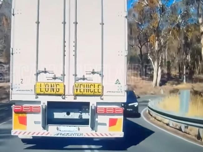 A driver caught the shocking dashcam footage of a series of close calls between B double and oncoming-traffic on a winding Adelaide Hills road.