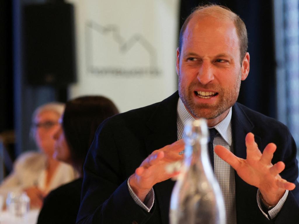 Still rocking his beard, Prince William jokes around with the crowd at an event in Aberdeen, Scotland. Picture: Russell Cheyne/Getty Images