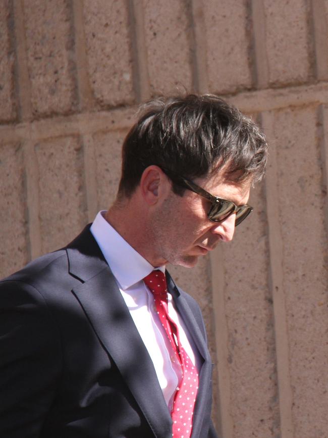 Lawyer James Stuchbery, representing the Department of Logistics and Infrastructure, leaves the Alice Springs Local Court. Picture: Gera Kazakov