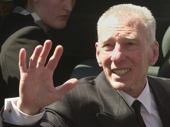 British gangster Reggie Kray, three years after marrying Roberta, attending funeral of his brother Charlie in April 2000, months before his own death.