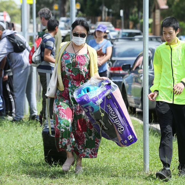 6/3/20: Students from Epping Boys High school return from a school camp.. John Feder/The Australian