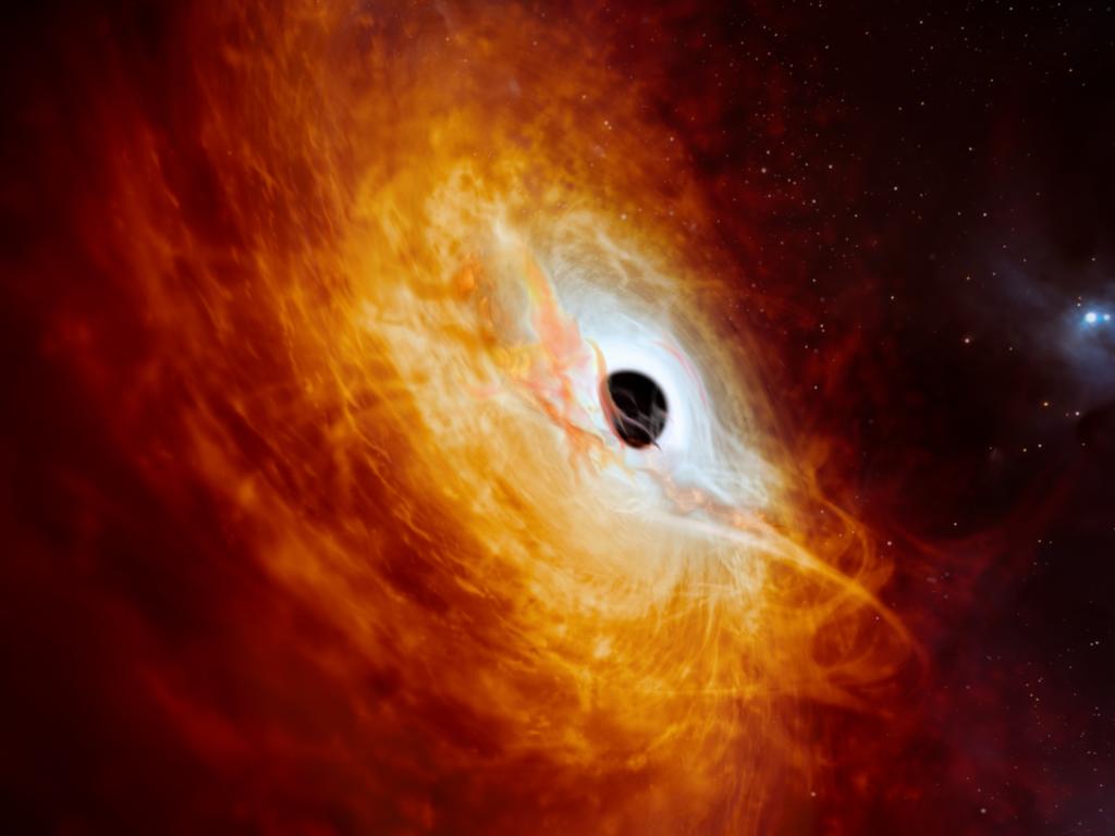 KIDS NEWS 2024: February 20 . This artist's impression shows the record-breaking quasar J059-4351, the bright core of a distant galaxy that is powered by a supermassive black hole. 
Using ESO's Very Large Telescope (VLT) in Chile, this quasar has been found to be the most luminous object known in the universe to date. The supermassive black hole, seen here pulling in surrounding matter, has a mass 17 billion times that of the Sun and is growing in mass by the equivalent of another Sun per day, making it the fastest-growing black hole ever known. Picture: European Southern Observatory (ESO)