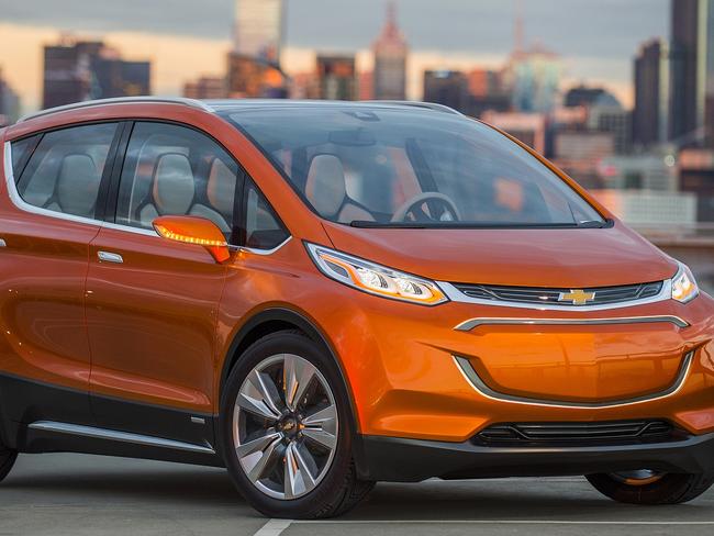 2015 Chevrolet Bolt EV Concept all electric vehicle. Front Â¾ in city scape. Bolt EV Concept builds upon Chevyâ€™s experience gained from both the Volt and Spark EV to make an affordable, long-range all-electric vehicle to market. The Bolt EV is designed to meet the daily driving needs of Chevrolet customers around the globe with more than 200 miles of range and a price tag around $30,000.