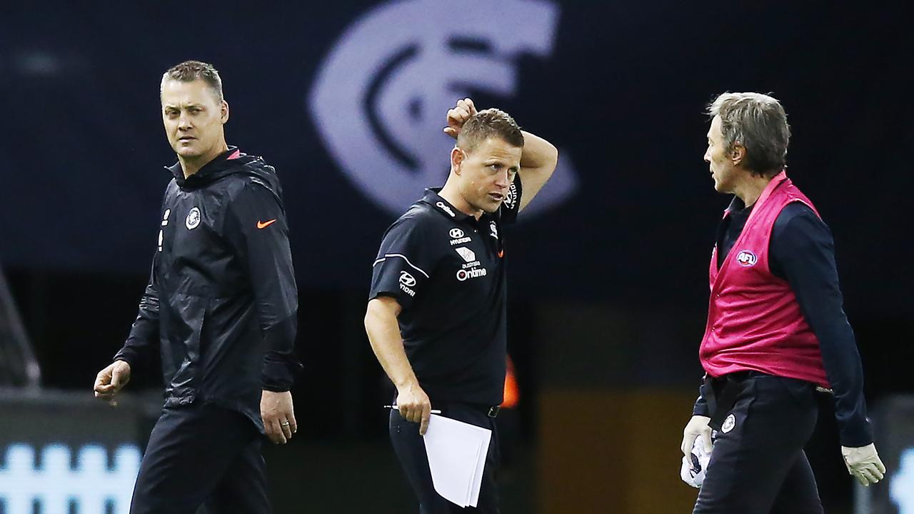 Brendon Bolton (centre) was left scratching his head after a woeful Carlton performance. Photo: Michael Dodge/Getty Images.