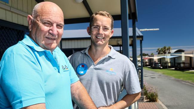 Adelaide’s Discovery Parks is taking over Top Parks in a $25 million deal. Top Parks Richard Emerson (left) with CEO Grant Wilckens at Semaphore site by the beach. PIC: Russell Millard AAP