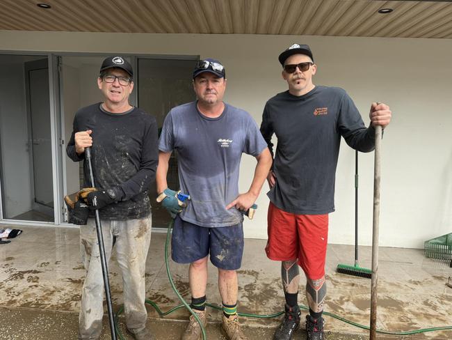 Pat Conaghan, the federal Member for Cowper (middle) helping out during the flooding on the mid-north coast. Picture Facebook