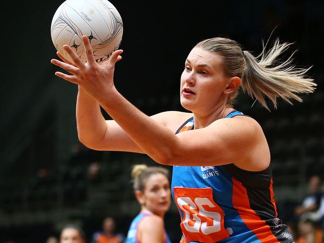 SYDNEY, AUSTRALIA - FEBRUARY 18:  Kristina Brice of Canberra takes a pass during round one of the ANL match between Canberra Giants and Netball NSW Waratahs at Sydney Olympic Park Sports Centre on February 18, 2017 in Sydney, Australia.  (Photo by Mark Nolan/Getty Images)