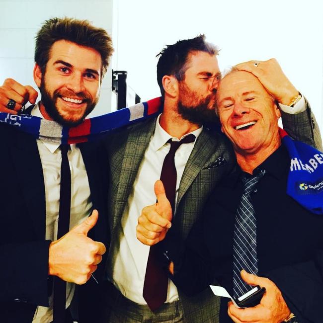 Liam, Chris and dad Craig Hemsworth celebrating the Western Bulldogs AFL grand final win in September 2016. Picture: Instagram