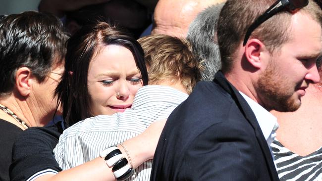 Mourners at the funeral for Timmy O’Brien after he was brutally murdered.