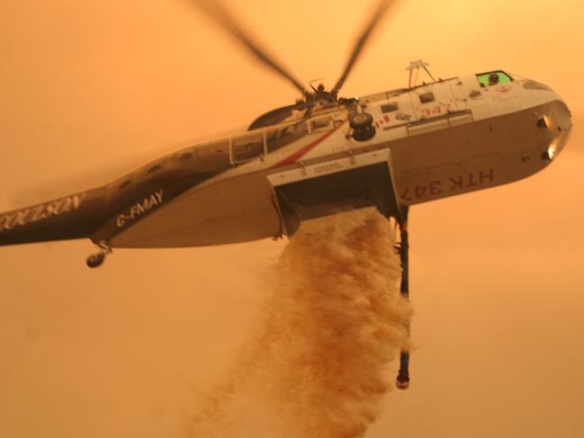 A firefighting helicopter water dropping on Black Saturday. 