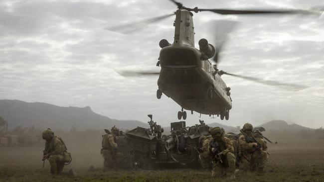 An army CH-47 Chinook takes off after dropping off a M777 Howitzer from 4th Regiment, Royal Australian Artillery, during Exercise Talisman Sabre 2023 at Shoalwater Bay Training Area, Queensland. Picture: Department of Defence