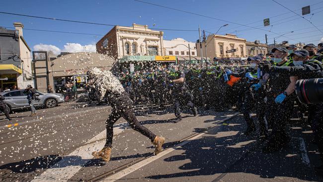 Protesters meet a huge police presence in Richmond, blocking off the CBD with a ‘ring of steel’. Picture: Jason Edwards