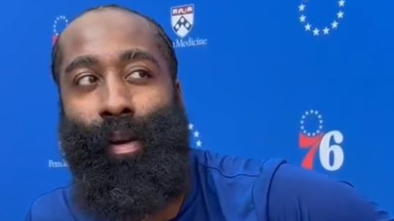 James Harden speaks to reporters.