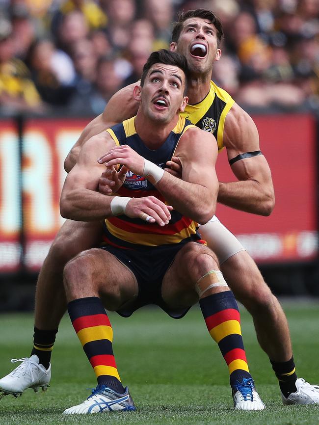 Alex Rance wrestles with Taylor Walker. Picture: Phil Hillyard